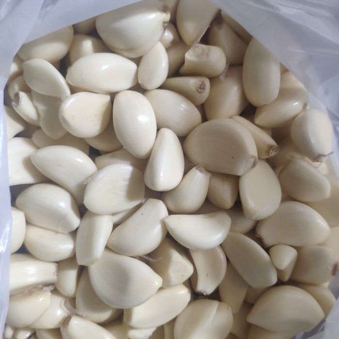 Cara Hemat Tenaga Kupas Bawang